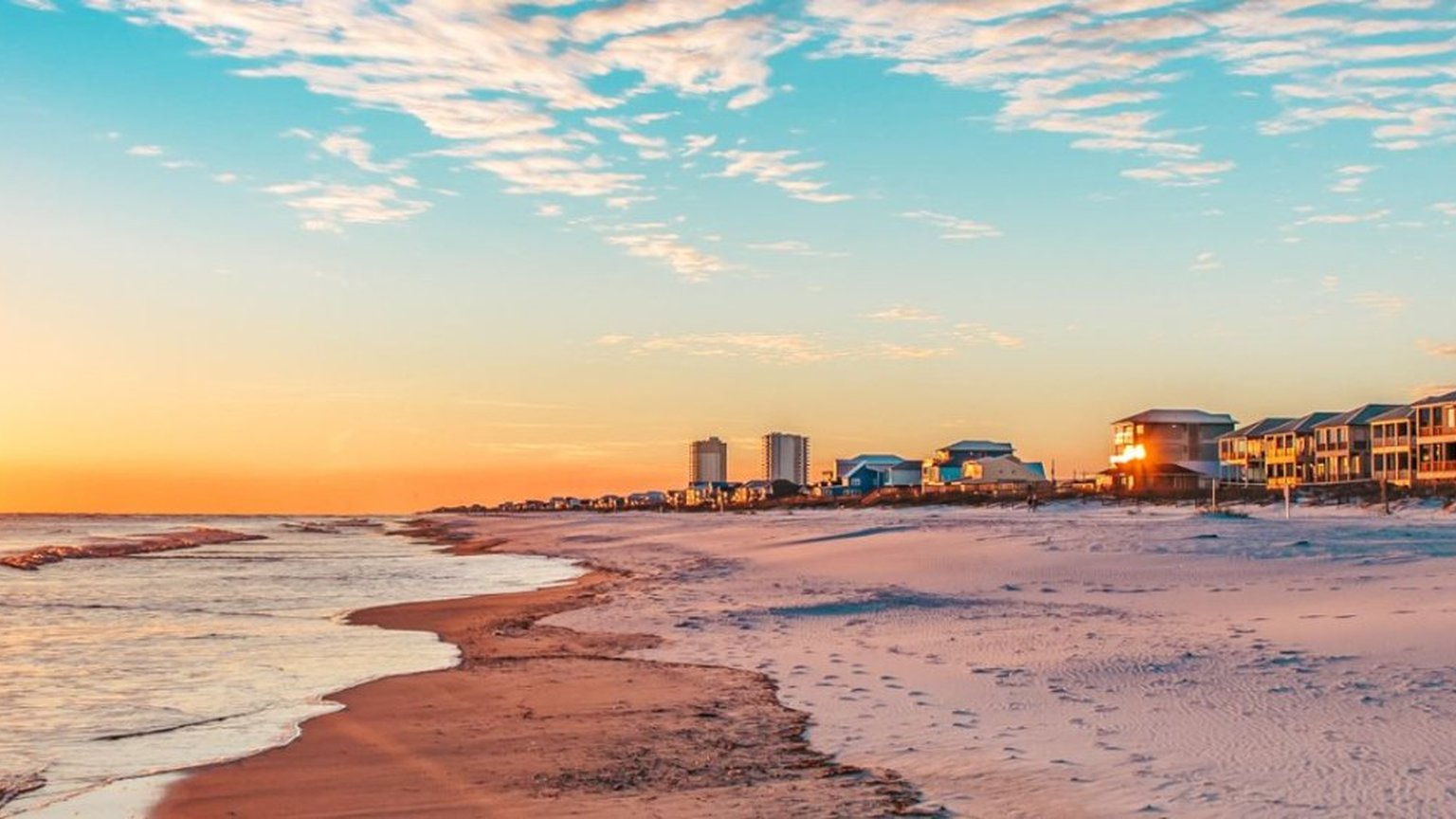 Gulf State Park fishing pier and white sand beach in Gulf Shores, Alabama