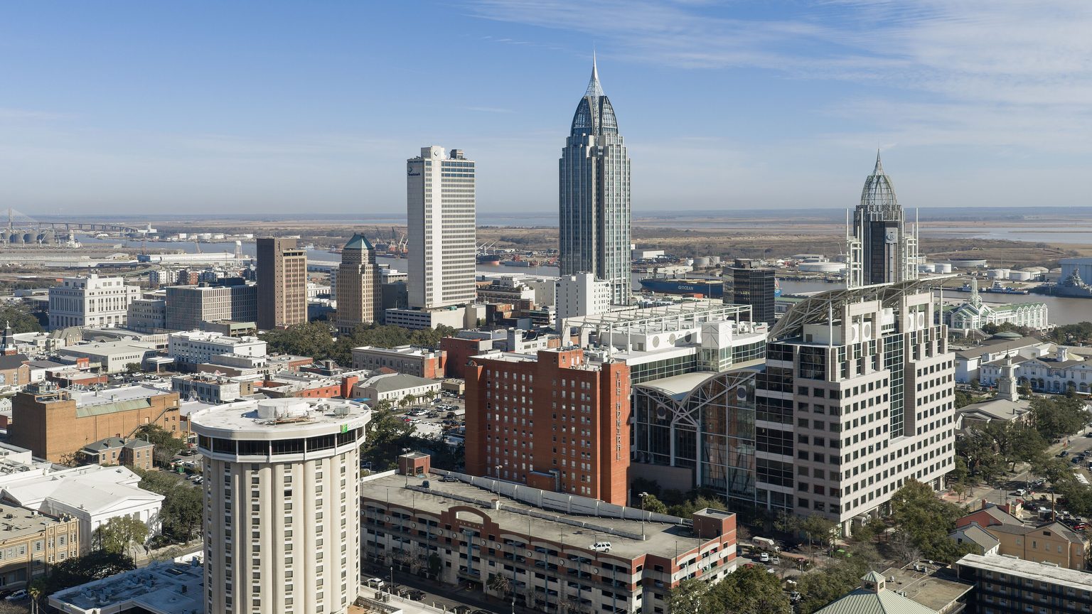 Downtown Mobile, Alabama skyline along the Mobile River at golden hour